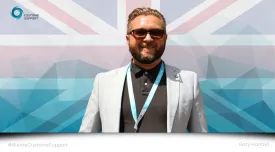 Gary Harrold in front of a UK flag