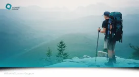 man stood on top of a mountain (life is a journey)